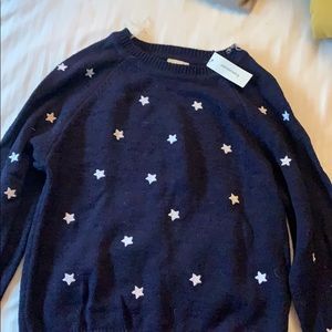 Navy blue sweater with white stars embroidered